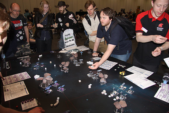 Spartan Martin running demonstration games on the second Halo: Fleet Battles table